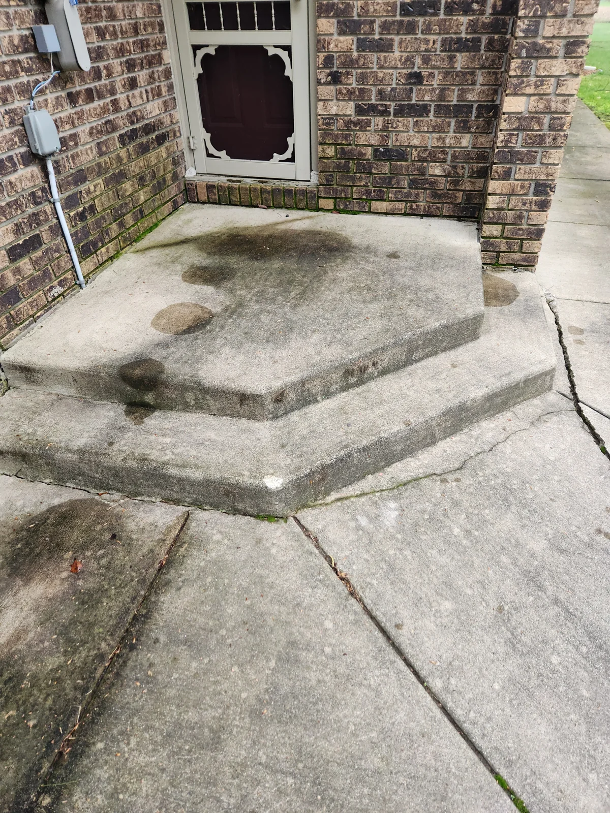 Concrete entry and steps before Kodiak cleaning